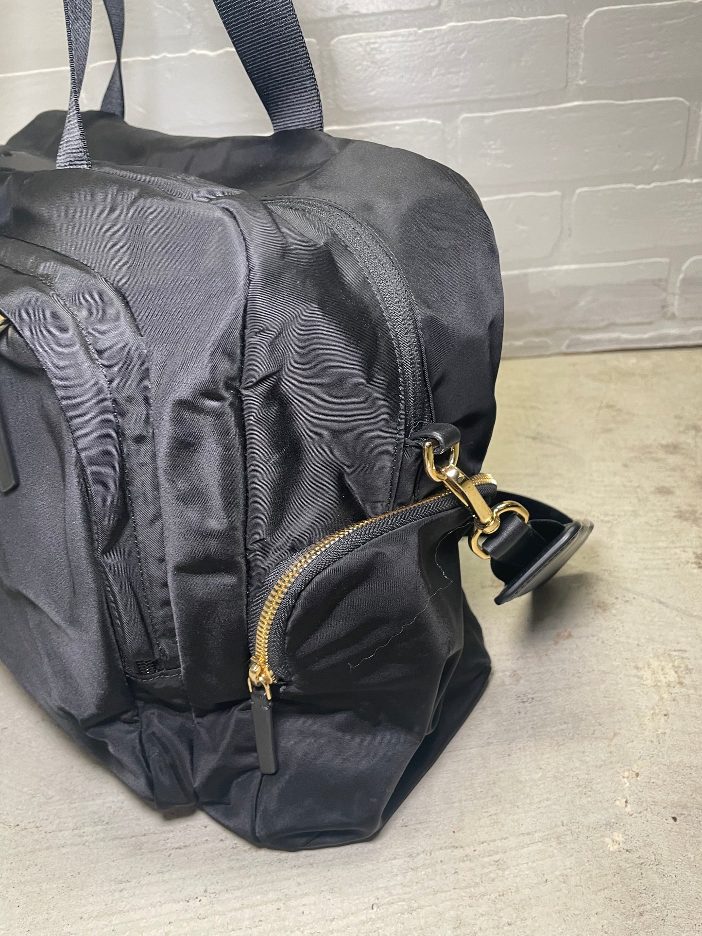 TUMI Black Nylon Weekender Duffel Bag with Gold Hardware